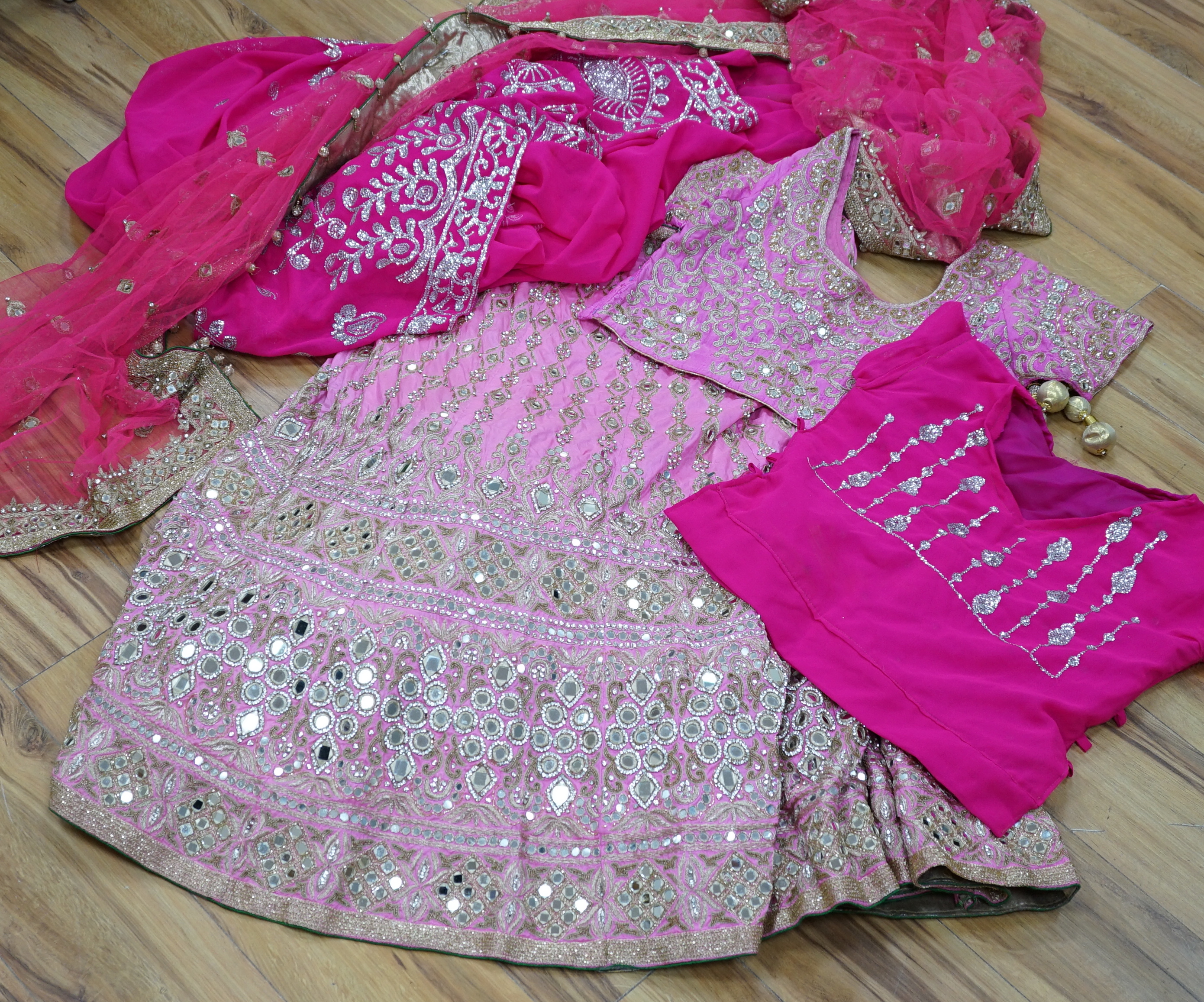 A collection of Indian silk saris and costume possibly bridal